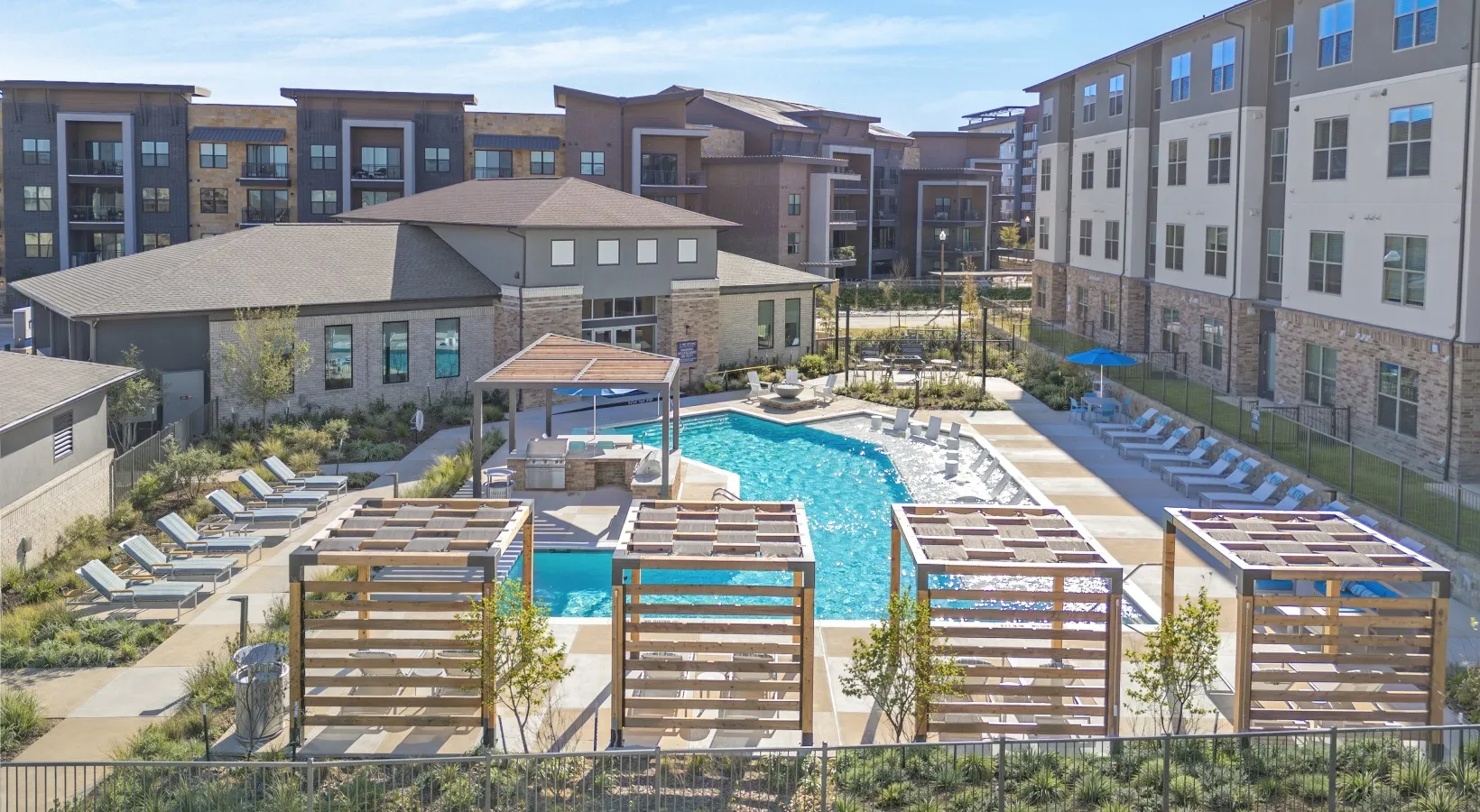 Resort-style pool with cabanas