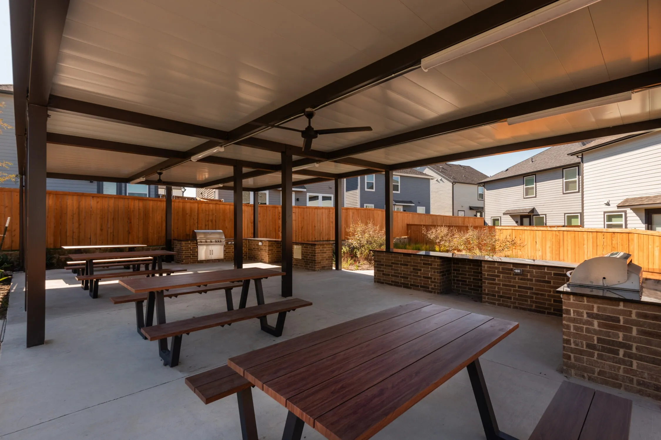 Shaded picnic space with grills and dining