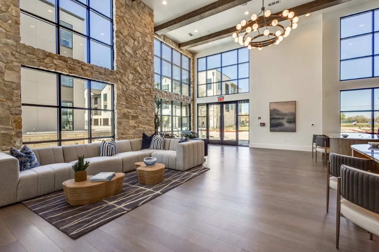 Resident clubhouse lounge with stone accent wall