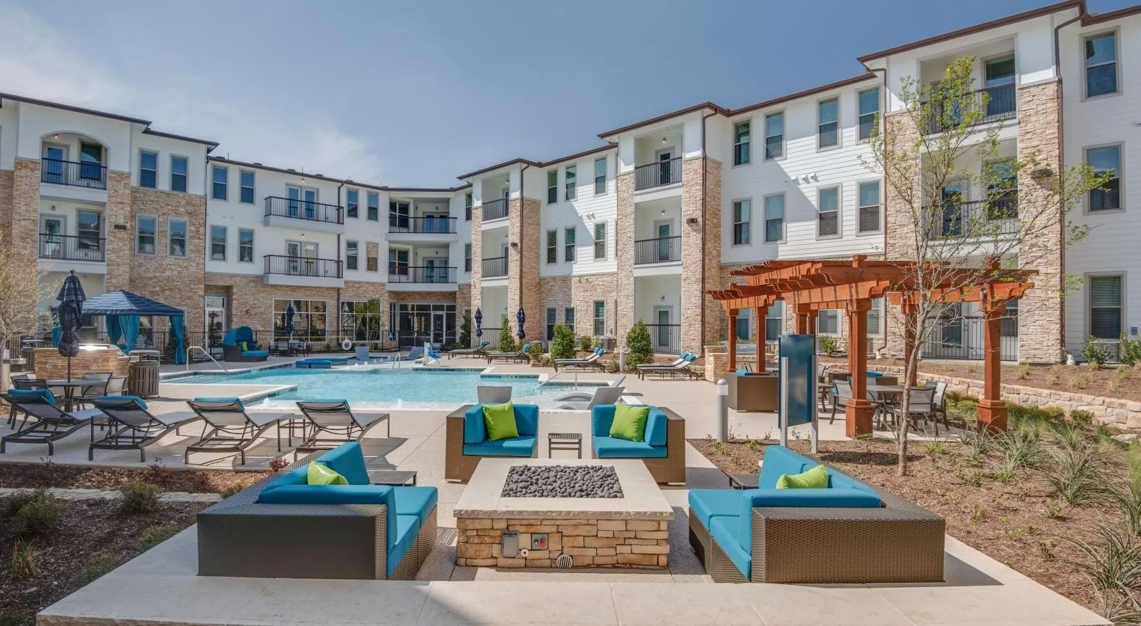 Resort-style pool with fire pit lounge at Bellrock Upper North