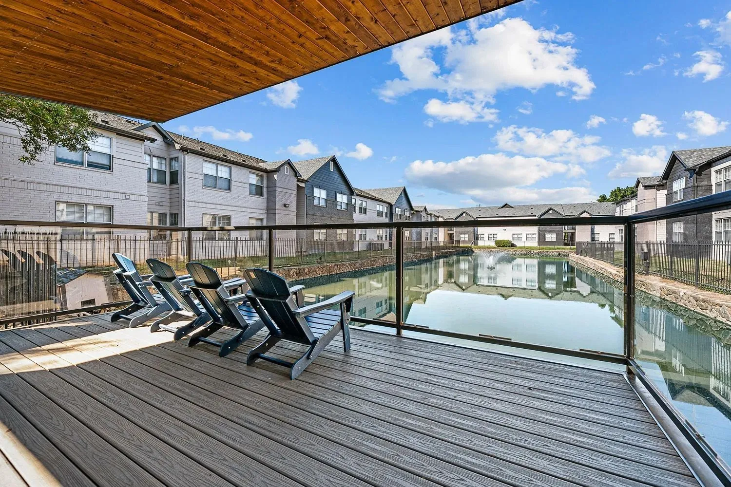 Sun deck with lounge chairs overlooking the water at 29Fifty