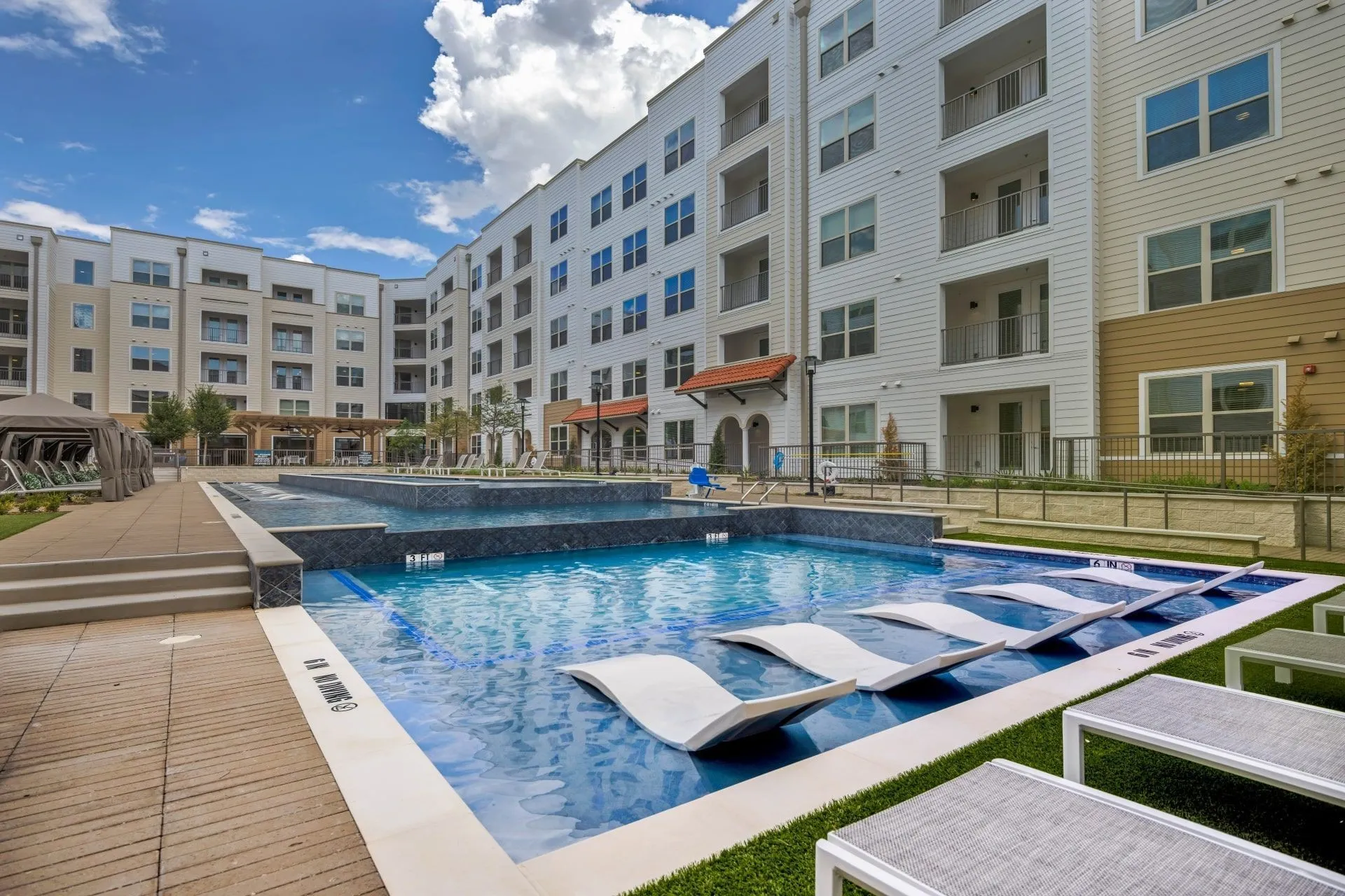 Ablon at Harbor Village - Swimming pool with sundeck, cabanas and lounge chairs