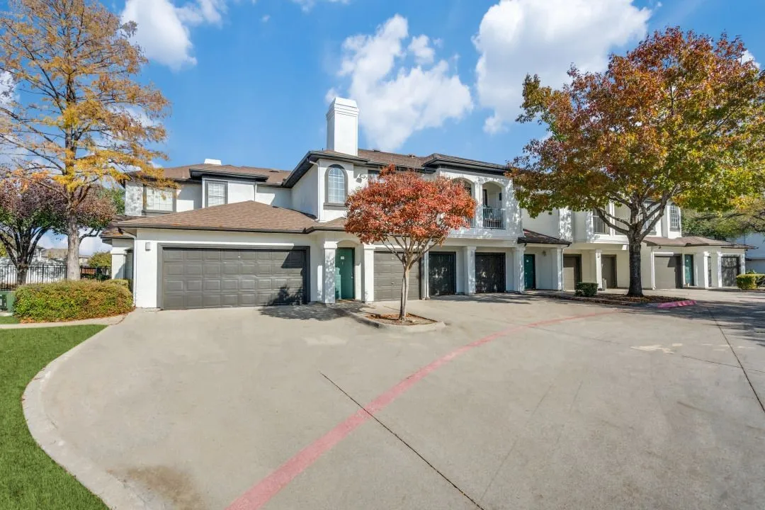 23Hundred at Ridgeview - driveways and garage doors of two-story apartment building