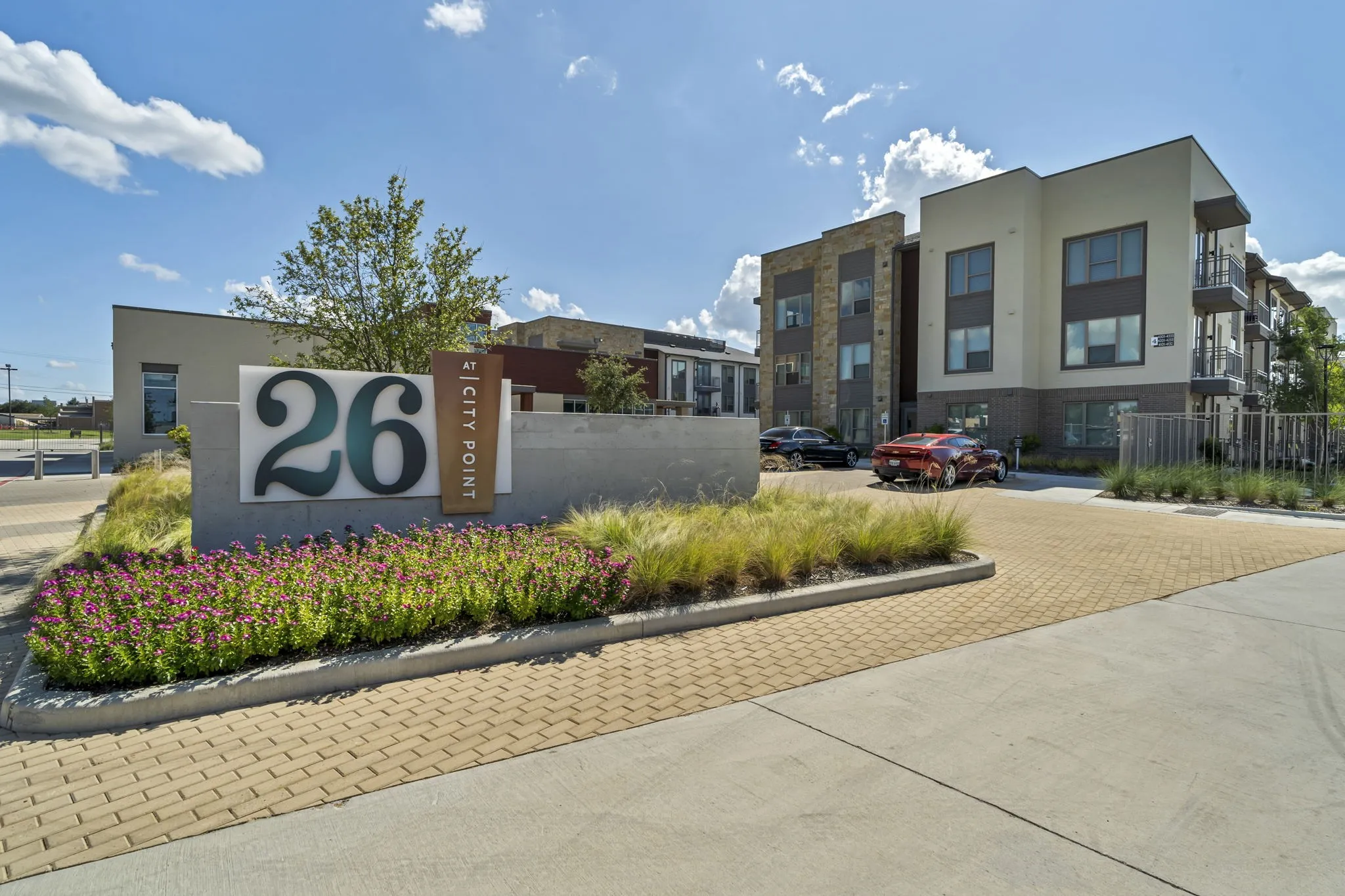 26 at City Point - A building with a sign that says 26 on it