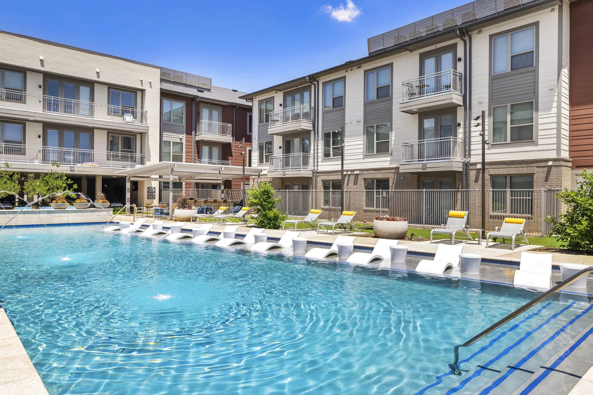 26 at City Point - A swimming pool in front of apartment buildings
