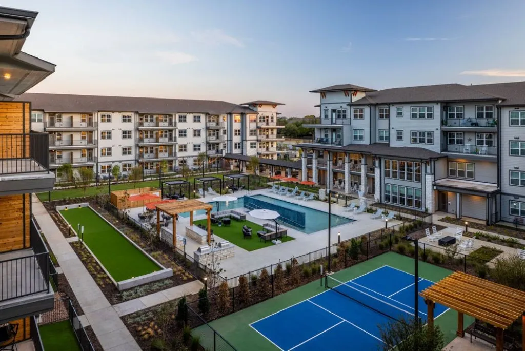 Affinity at Lewisville - Aerial view of the community with pool and pickleball court